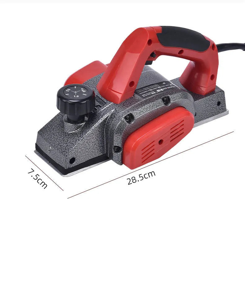 Red desktop electric wood planer with aluminium housing and 82mm planing width