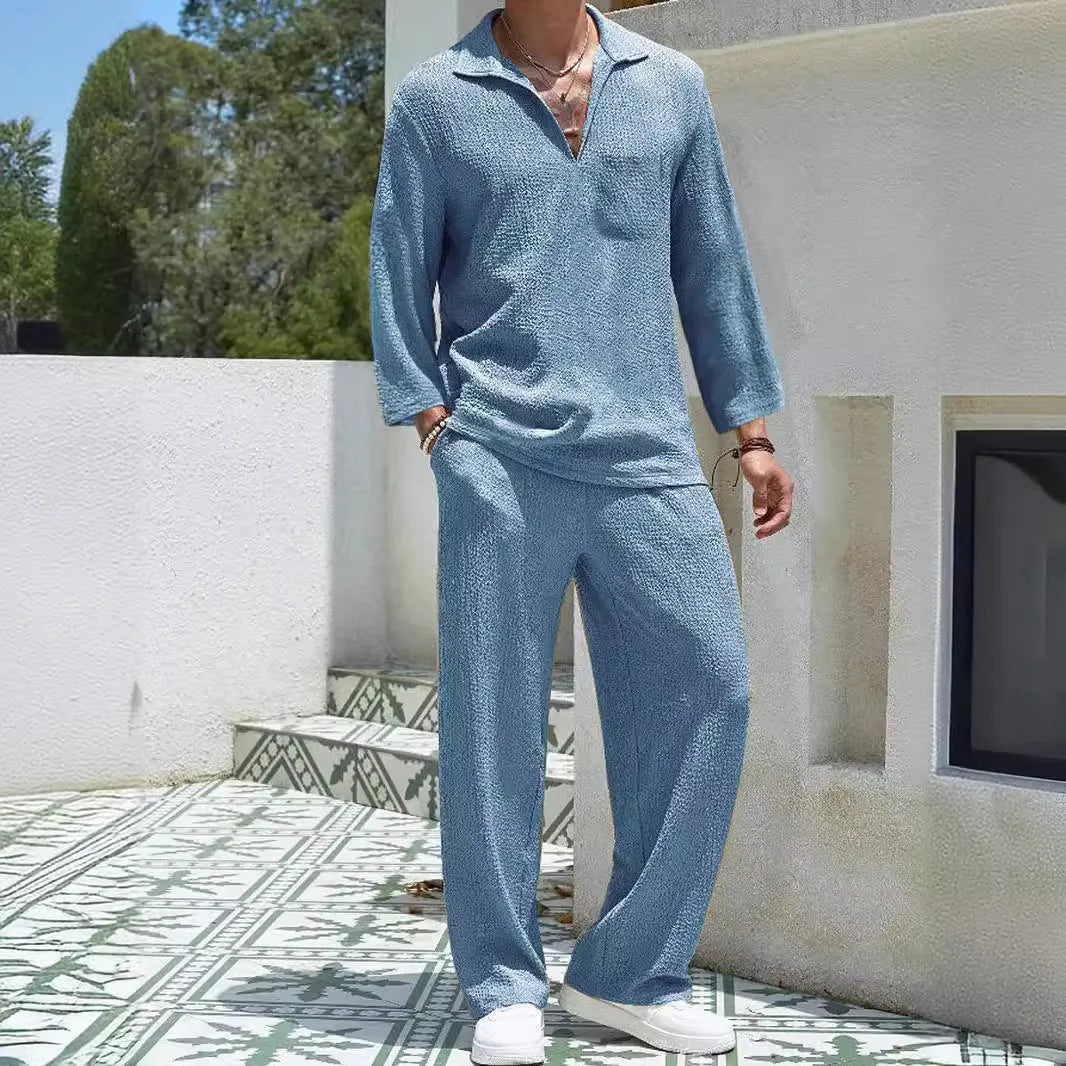 Men's casual shirt and trousers set in polyester fabric for autumn leisure wear.