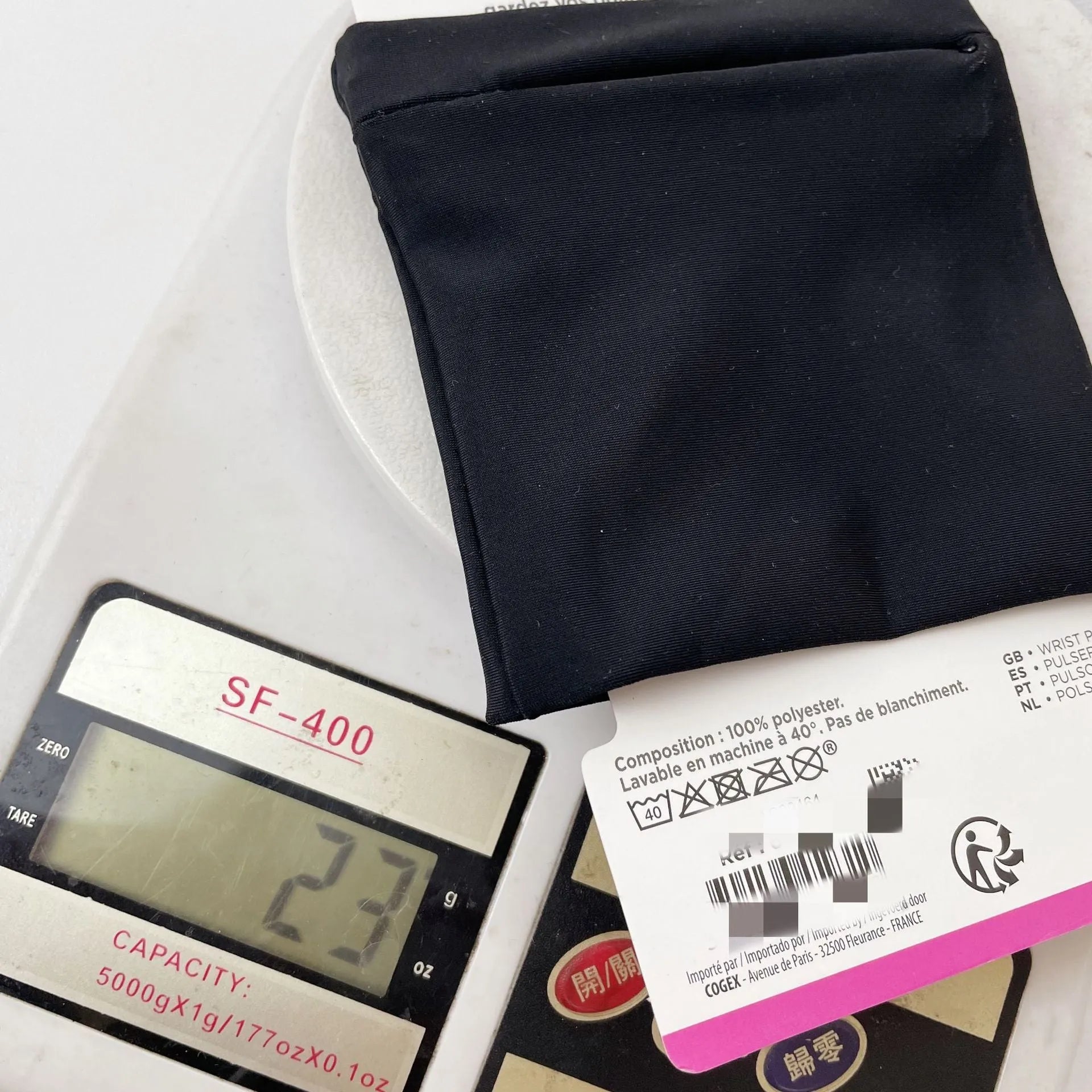 Camping wrist bag armband sleeve for mobile phone measuring 10cm by 10.5cm with packaging
