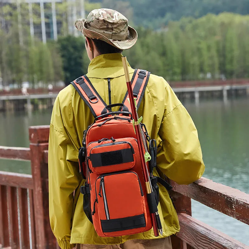 Orange and black outdoor backpack with 20-35 litre capacity for hiking and camping adventures