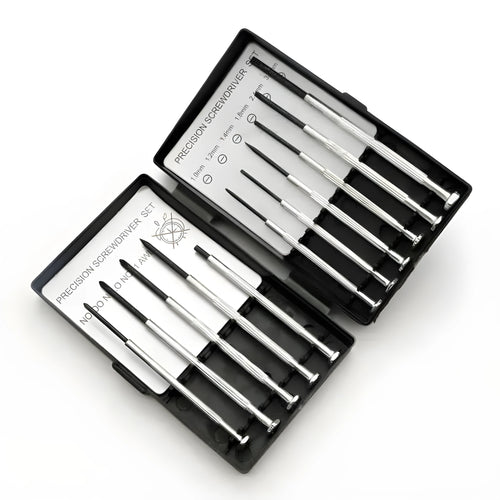 TH-6177 11-piece clock screwdriver set with multiple head types on a workbench.