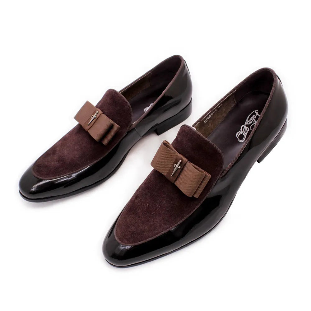 Men's glossy black patent leather low-top shoes with a tassel detail on a rubber sole.