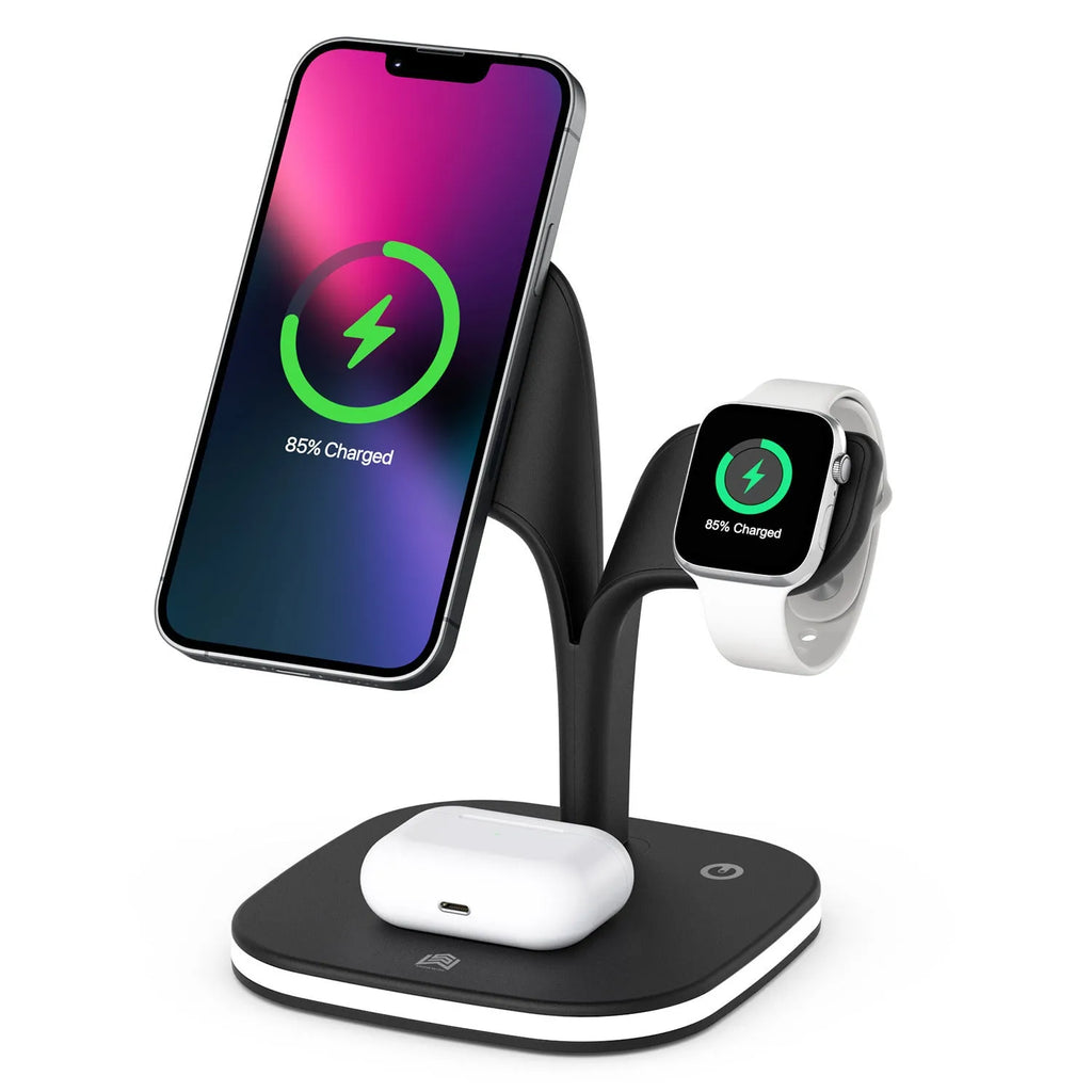 Black wireless charging stand holding a phone, a smartwatch, and wireless earbuds on a desk.