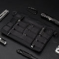 Black Oxford cloth portable outdoor kit measuring 18 by 3.5 centimetres for military enthusiasts