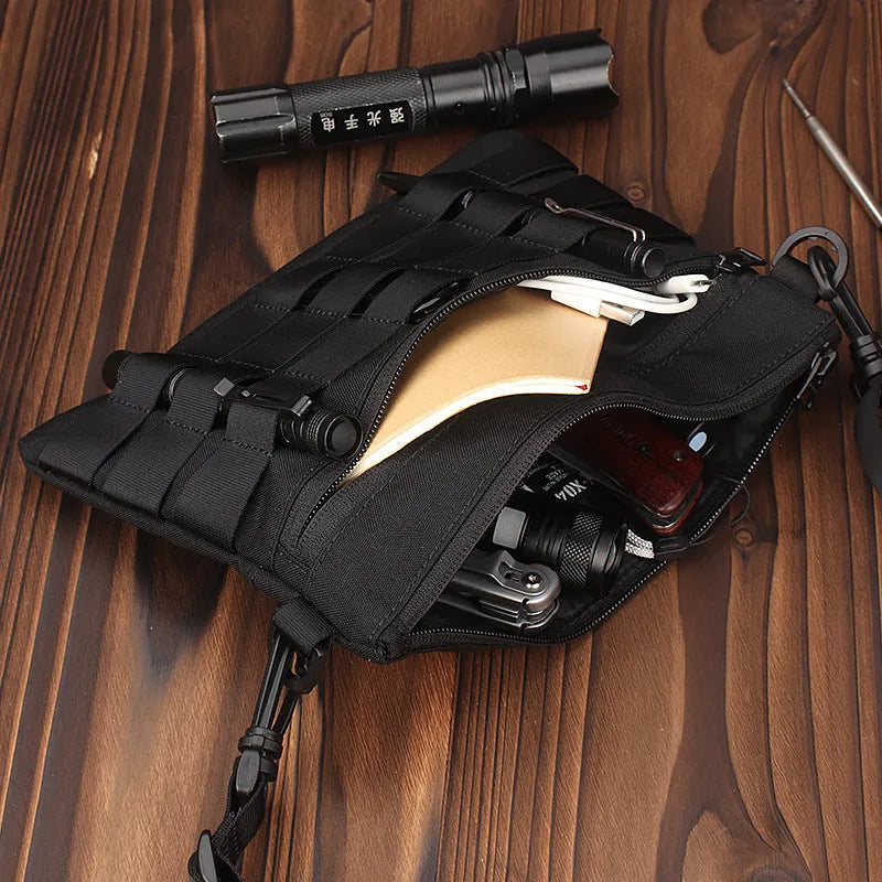 Black Oxford cloth portable outdoor kit measuring 18 by 3.5 centimetres for military enthusiasts