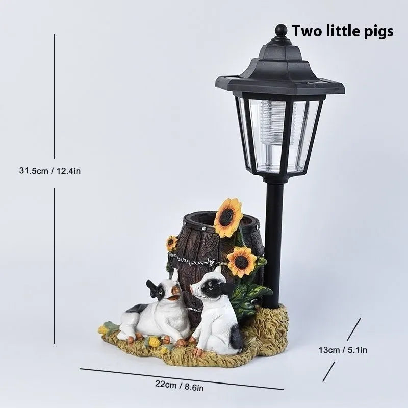 Solar garden lamp with resin figurine in American country style design