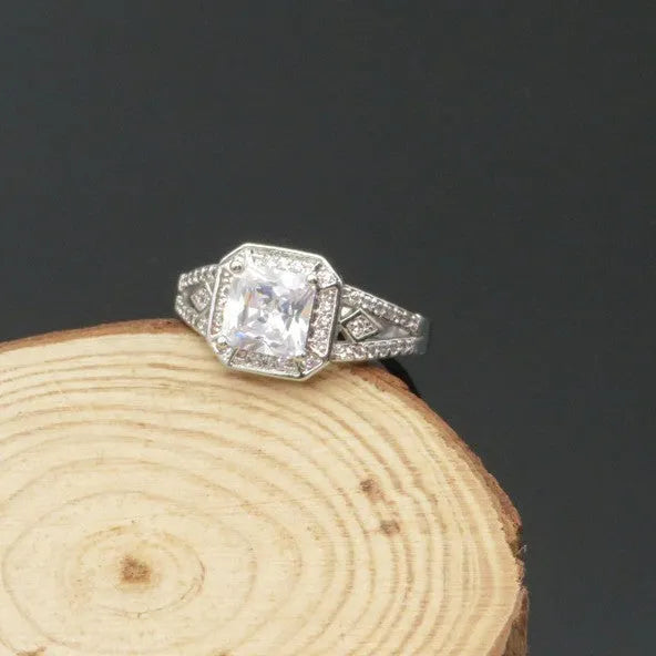 Geometric women's zircon ring with hollow ornament design in platinum colour