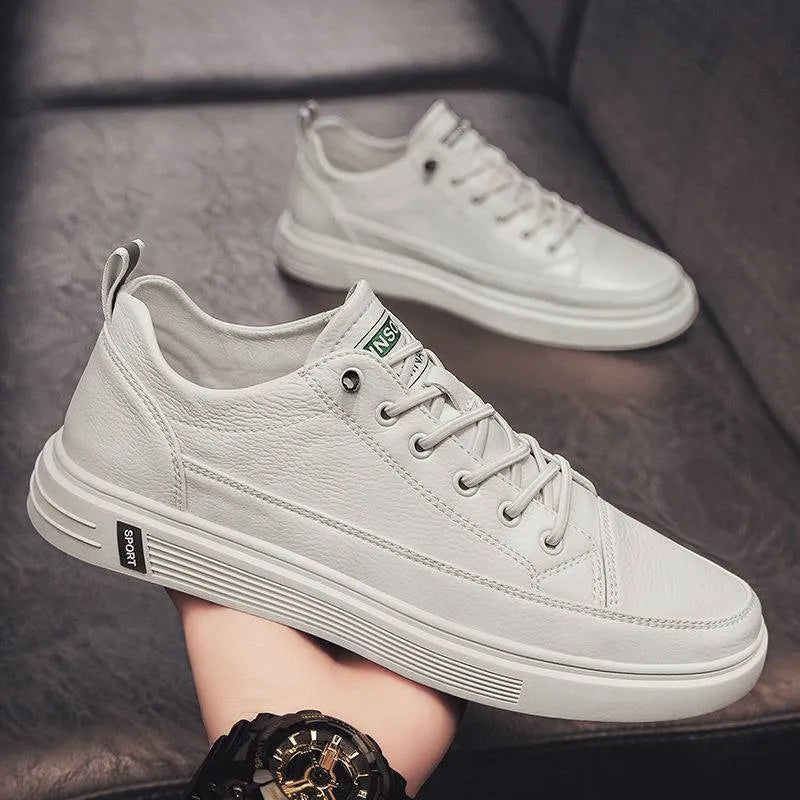 Men's white casual shoes with round toe, low heel, and shallow opening made from breathable PU material