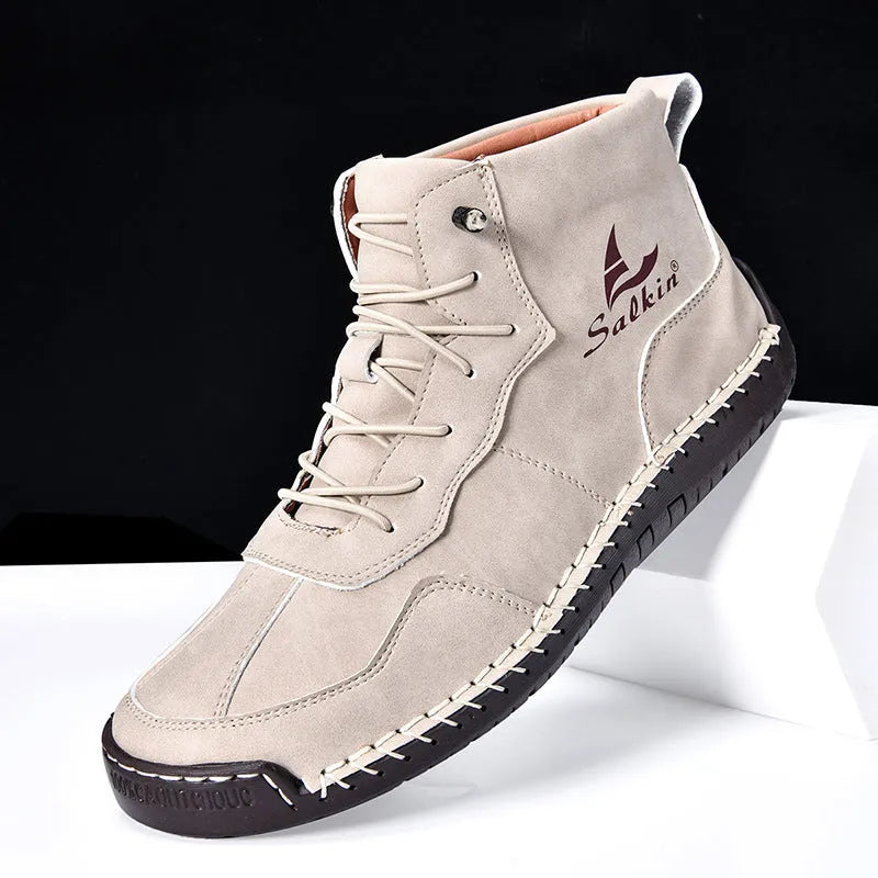 Retro high-top casual boots in beige with elastic band and flat rubber sole.