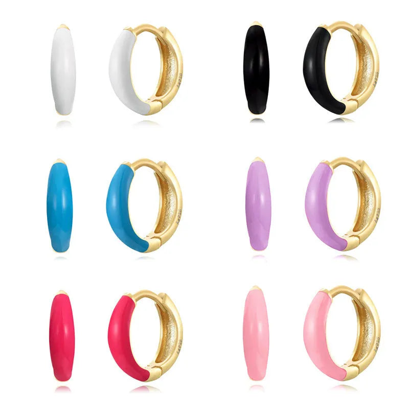 Curved oval epoxy drop earrings in multiple colours with silver needle posts and geometric U-shaped design