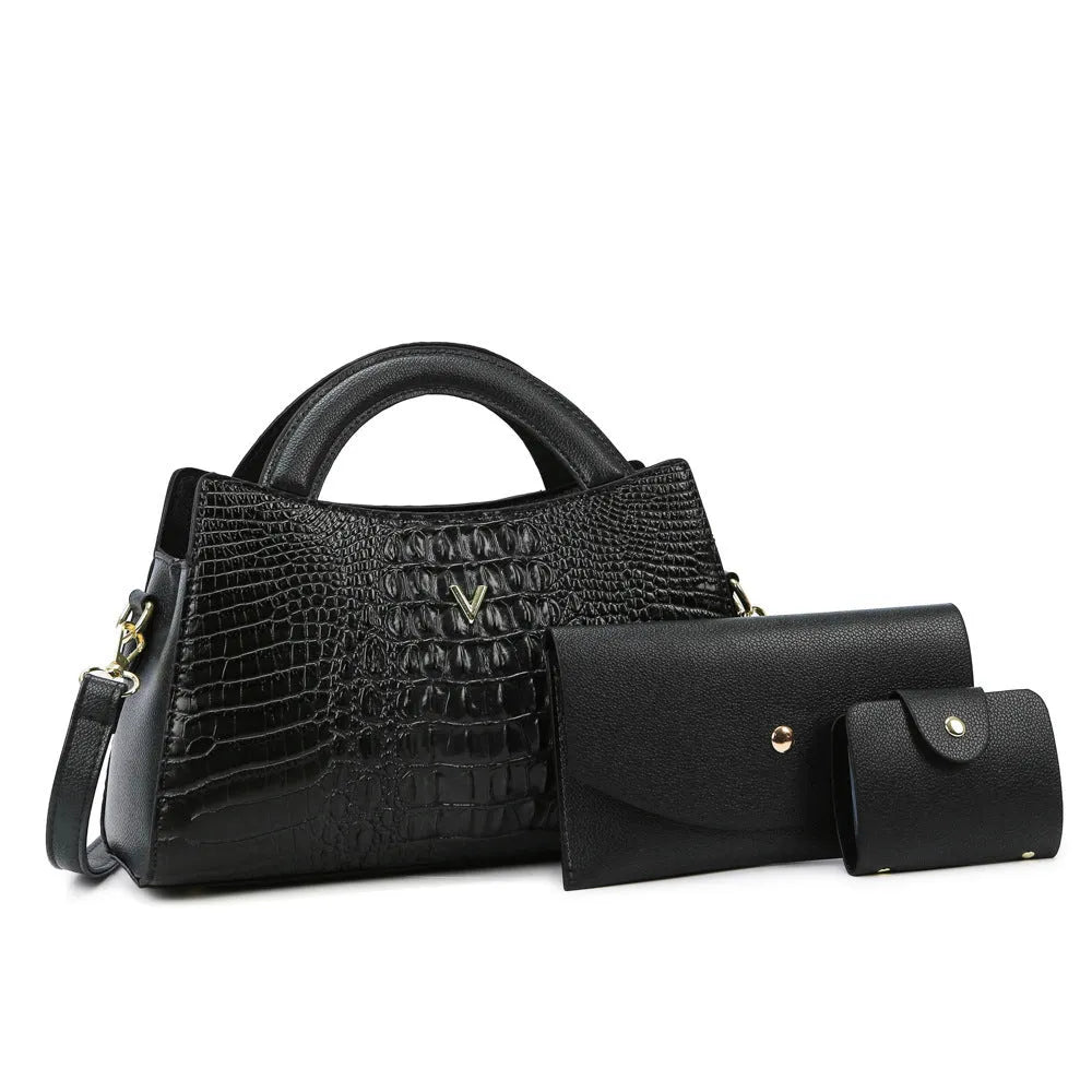 Women's black crocodile pattern PU leather crossbody shoulder bag with internal pockets.