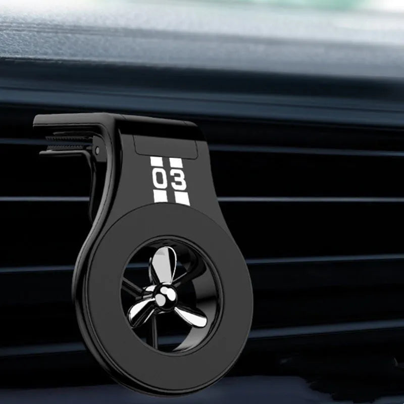Magnetic car phone holder mounted on car air vent with smartphone attached and adjustable angle bracket