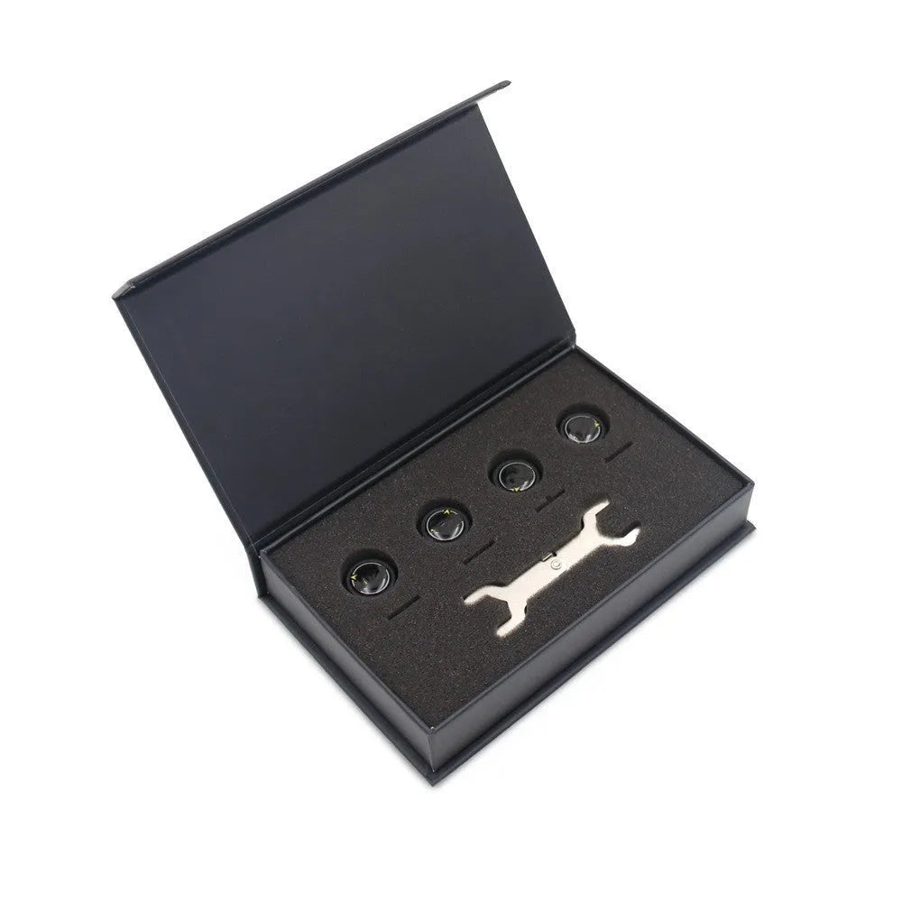 Black Bluetooth tire pressure monitoring system with four external sensors, wrench, and anti-theft screws