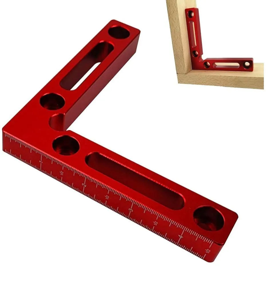 Aluminium right angle positioning clamp block for woodworking jigs, showing 90-degree corner and scale markings.