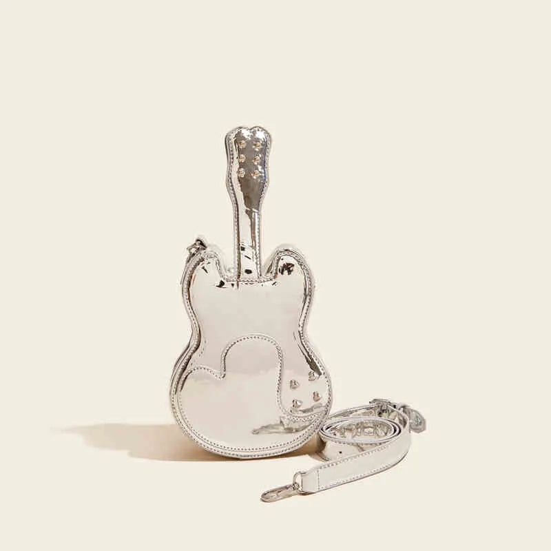 Guitar-shaped crossbody shoulder bag in silver, black, yellow, blue, or pink colours
