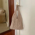 Women's retro crochet knitted woolen yarn shoulder tote bag showing hollow texture and double straps