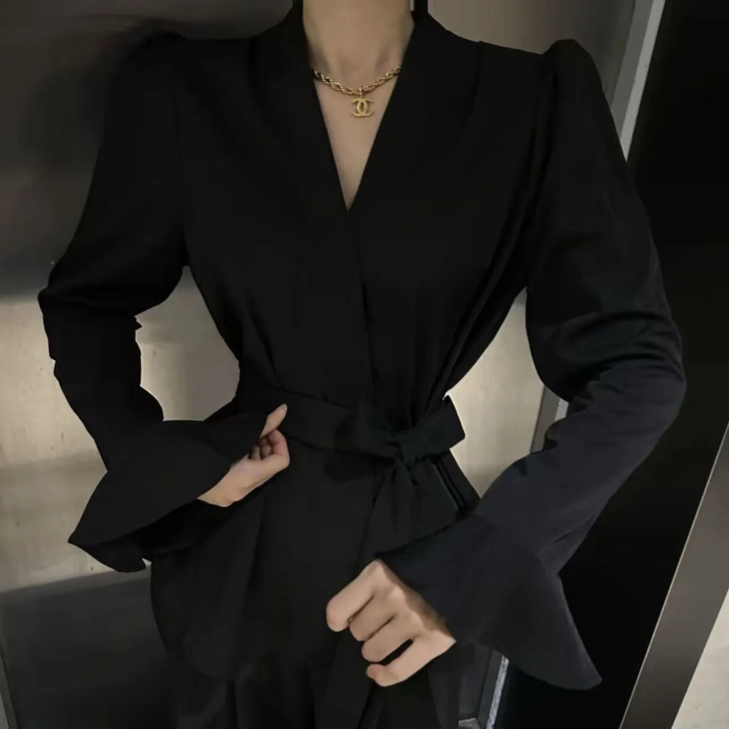 Women's French-style irregular collar shirt with long bell sleeves and tied front detail in polyester fabric