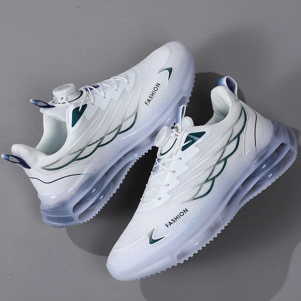 White low-top casual sports shoes with rotating button lace-up and mesh upper on a rubber sole.