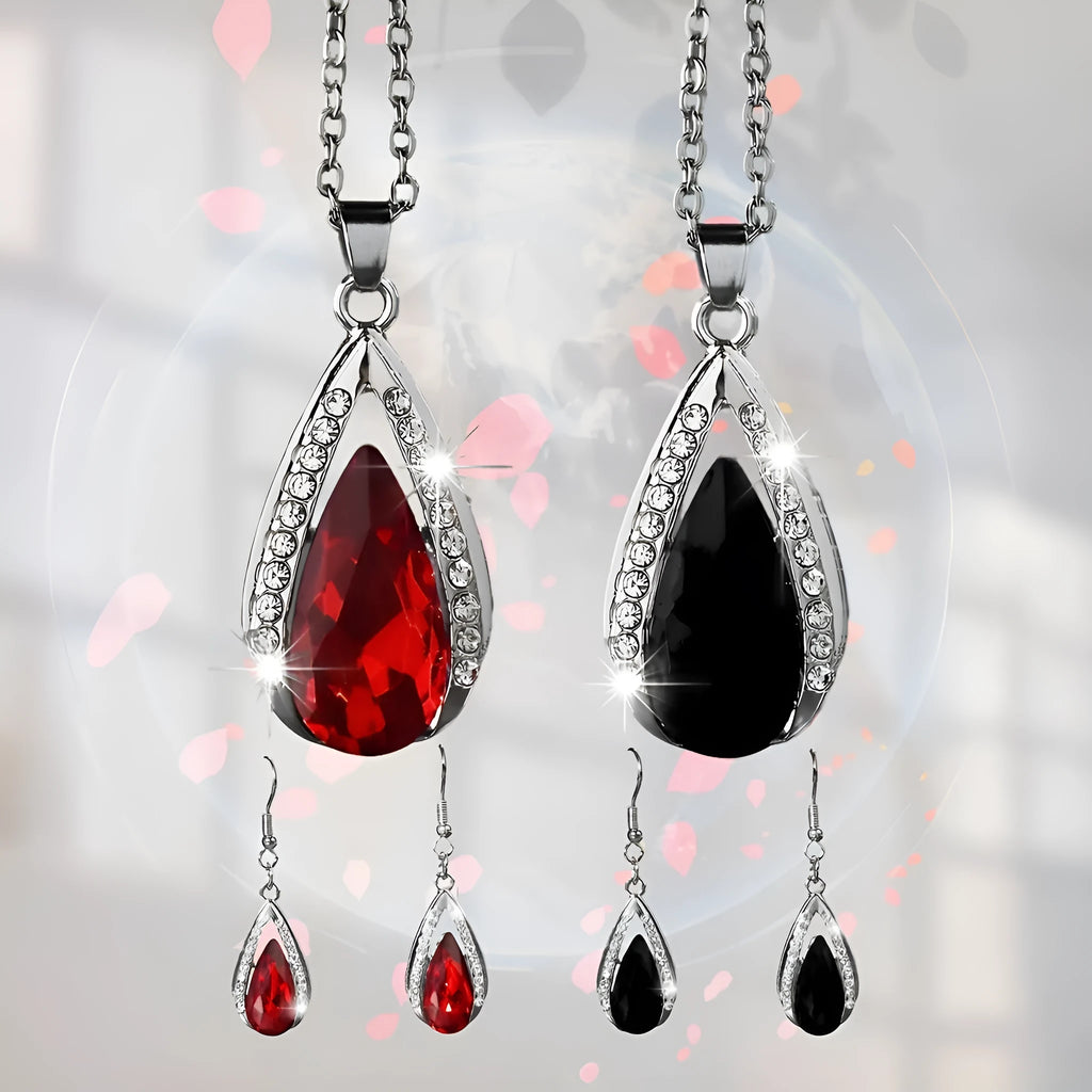 Black and red teardrop glass pendant necklace and matching earrings set on alloy chain.