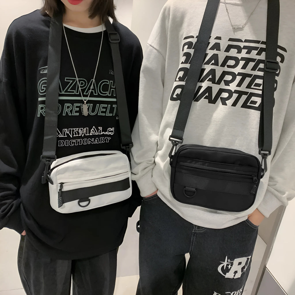 Men's street style nylon messenger bag in crossbody configuration with sewing thread detailing