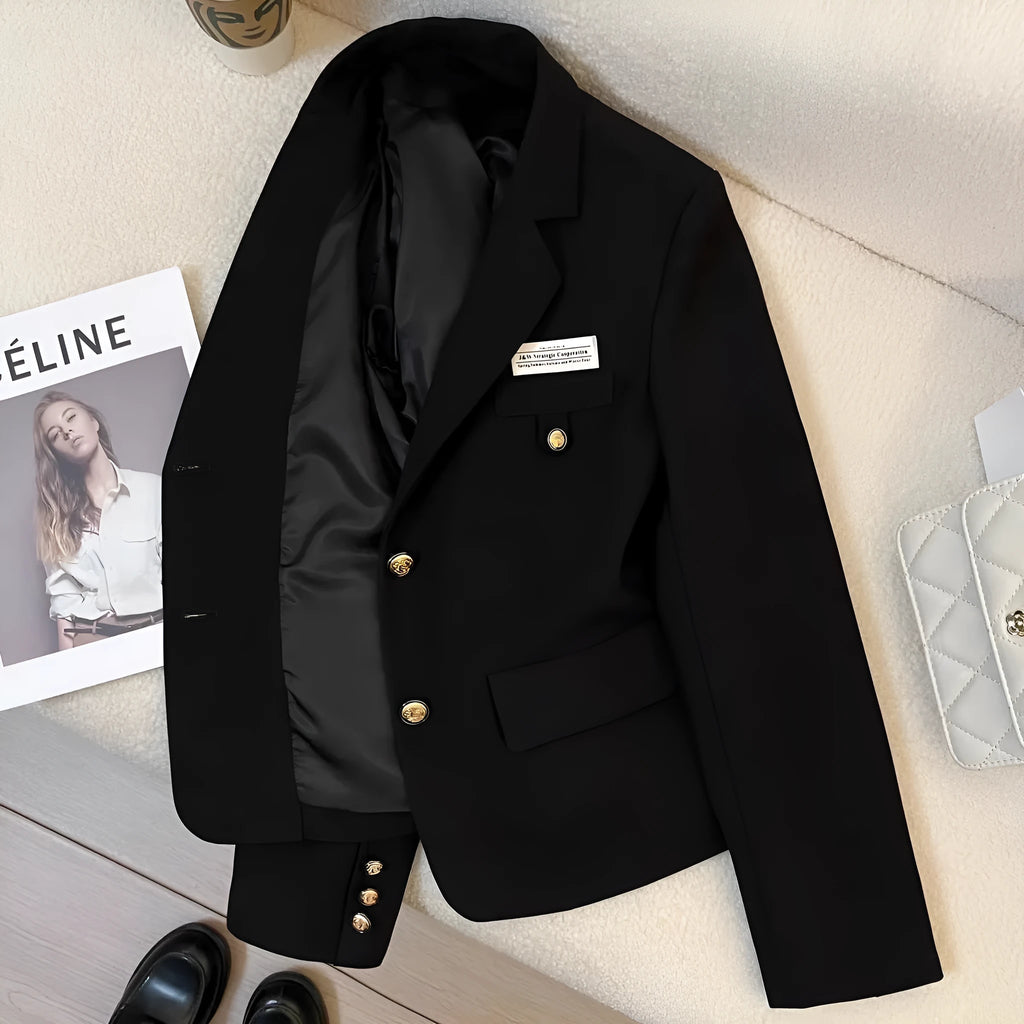 Women's black short suit coat with loose fit design and long sleeves