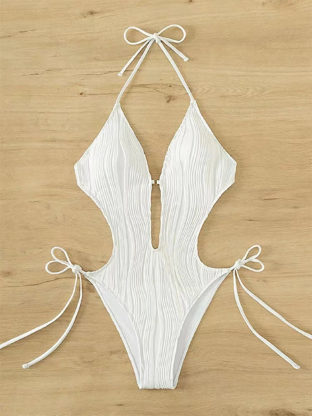 Women's black lace-up triangle bikini swimsuit with adjustable front detail