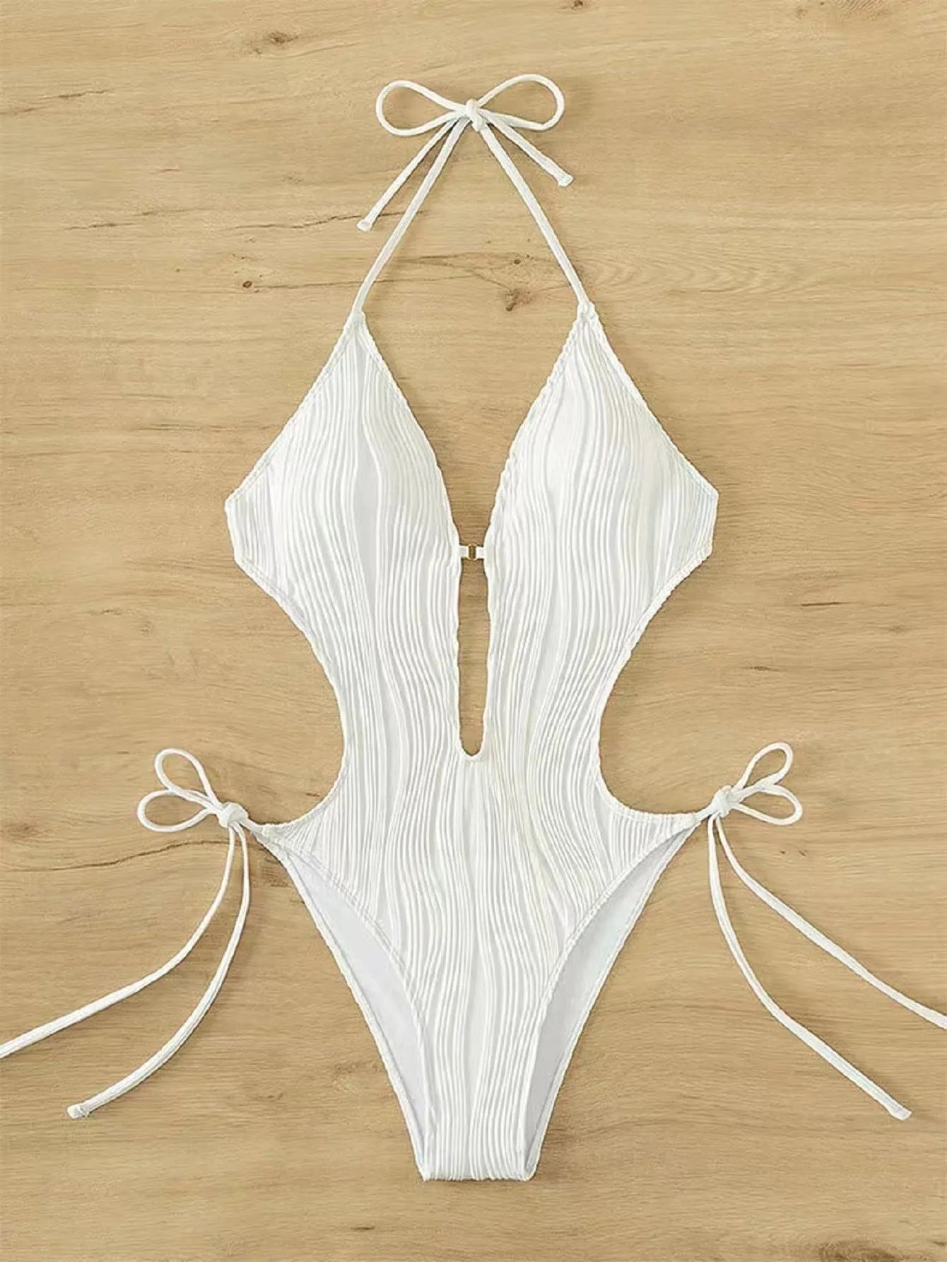 Women's black lace-up triangle bikini swimsuit with adjustable front detail