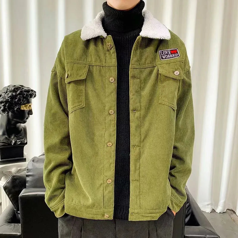 Man wearing a khaki loose-fit corduroy jacket with patch pockets