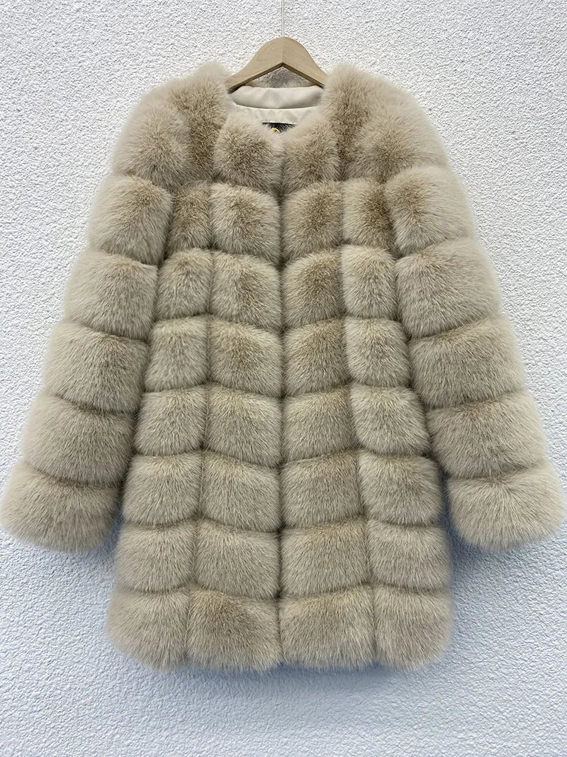 Women's long black artificial fur winter coat with regular sleeves on a hanger.