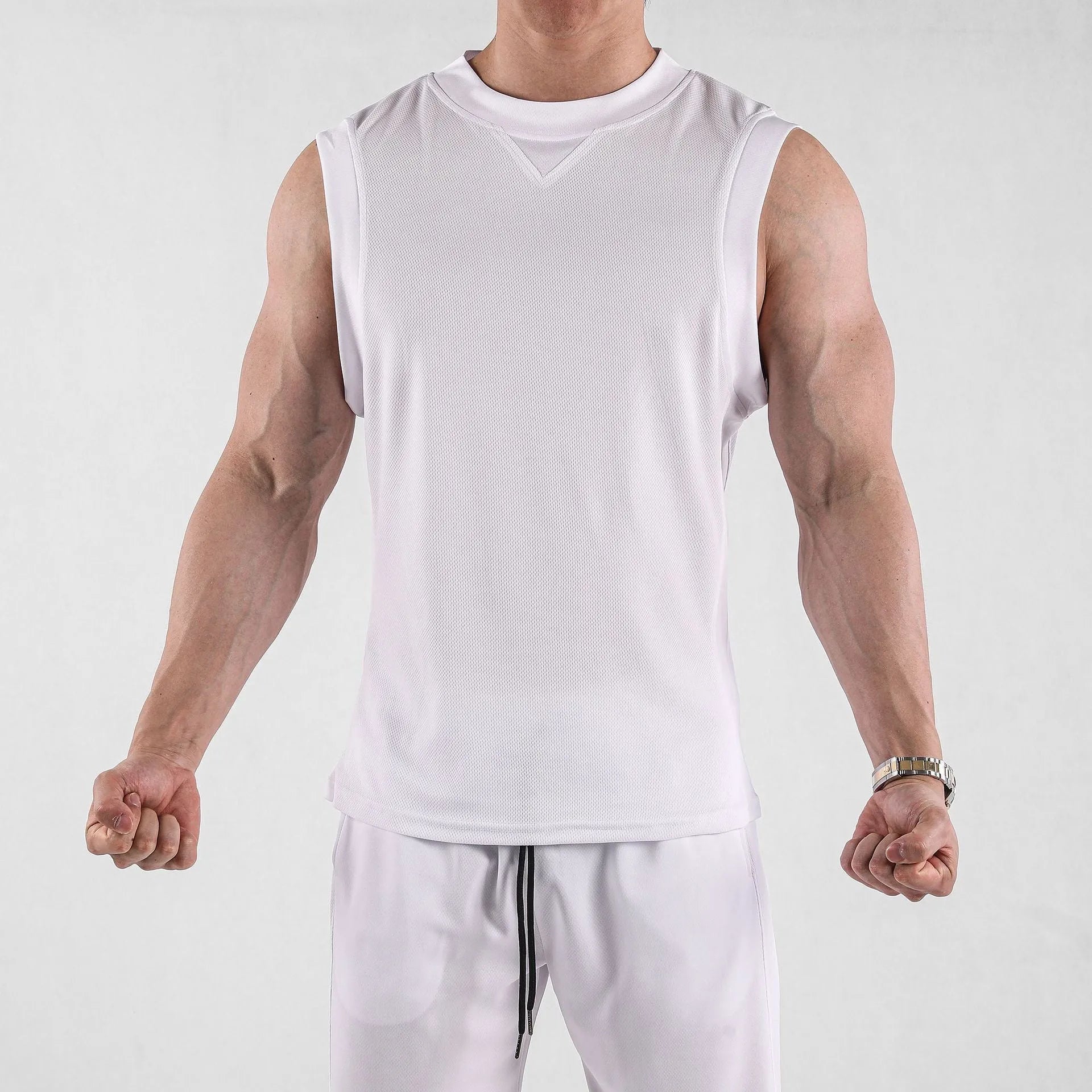 Men's loose fit polyester fitness vest in black colour showing quick-dry sportswear design
