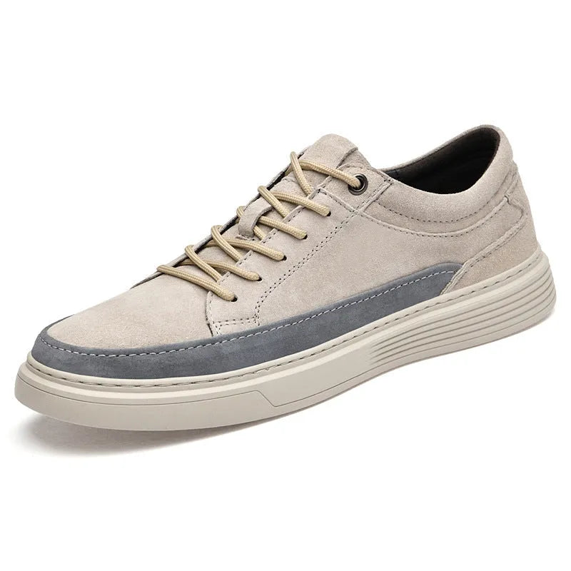 Men's grey casual leather skate shoes with round toe and low-top design on a rubber sole.