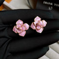 Gold-plated purple flower stud earrings with oil-spot glaze effect on copper material