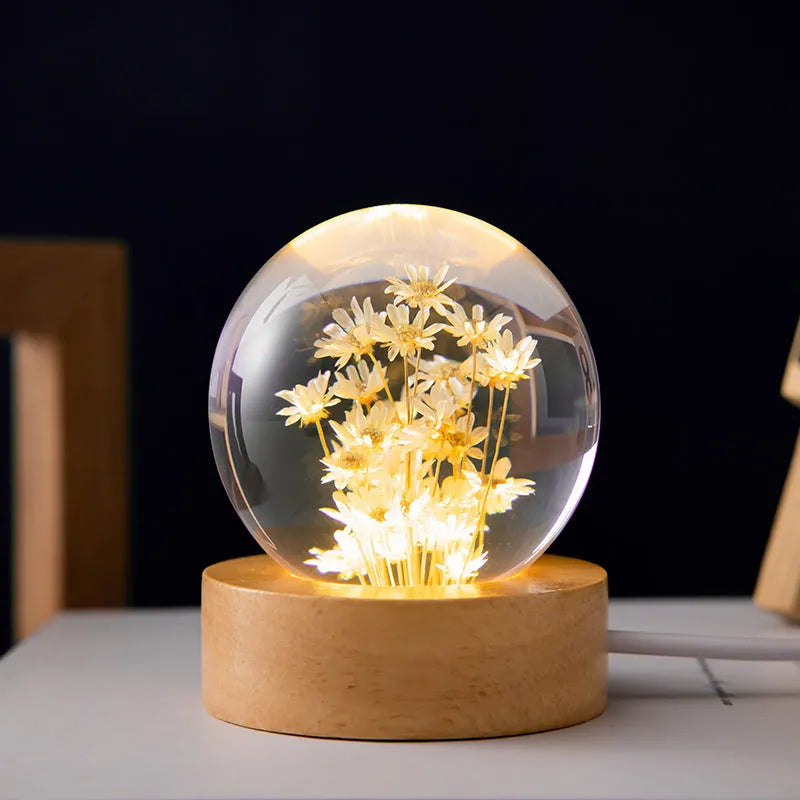 Luminous 3D dandelion crystal ball on a beech wood base, serving as a USB-powered desktop night light ornament.