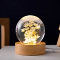 Luminous 3D dandelion crystal ball on a beech wood base, serving as a USB-powered desktop night light ornament.