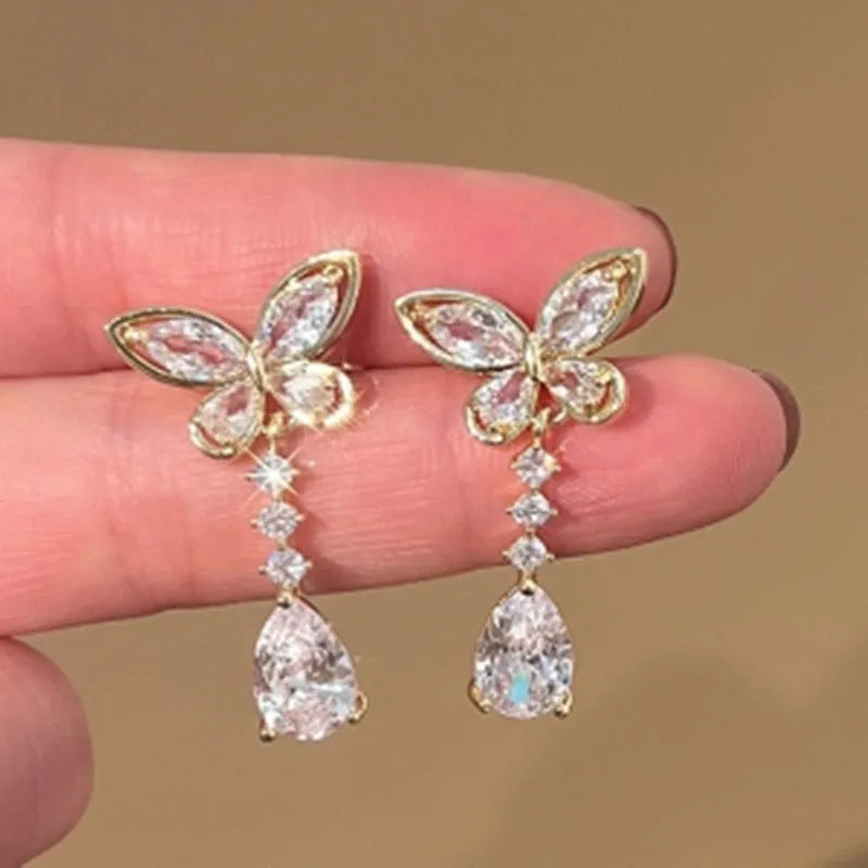 Bow-shaped stud earrings with platinum electroplated finish on zinc alloy for women's jewellery