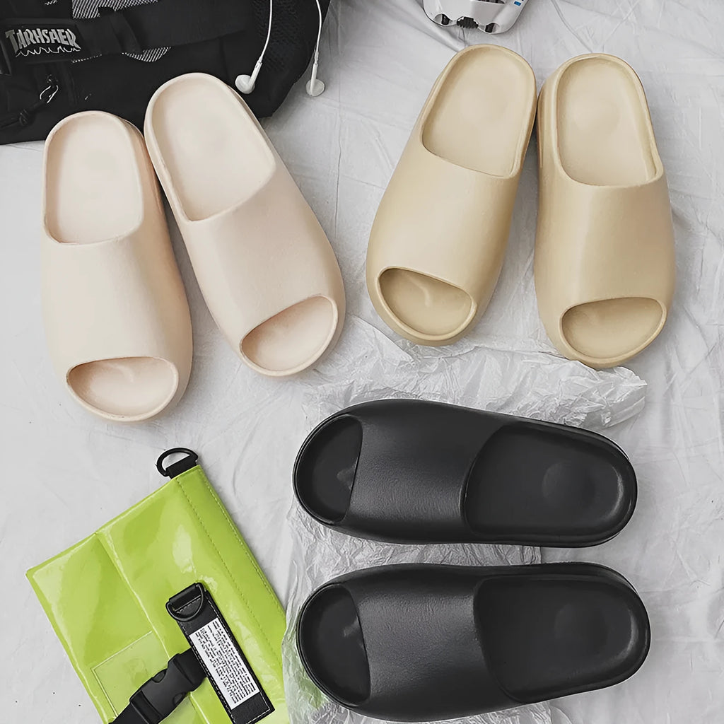 Women's thick bottom beach slippers in EVA with injection moulded soles, available in black, green, brown, and beige colours