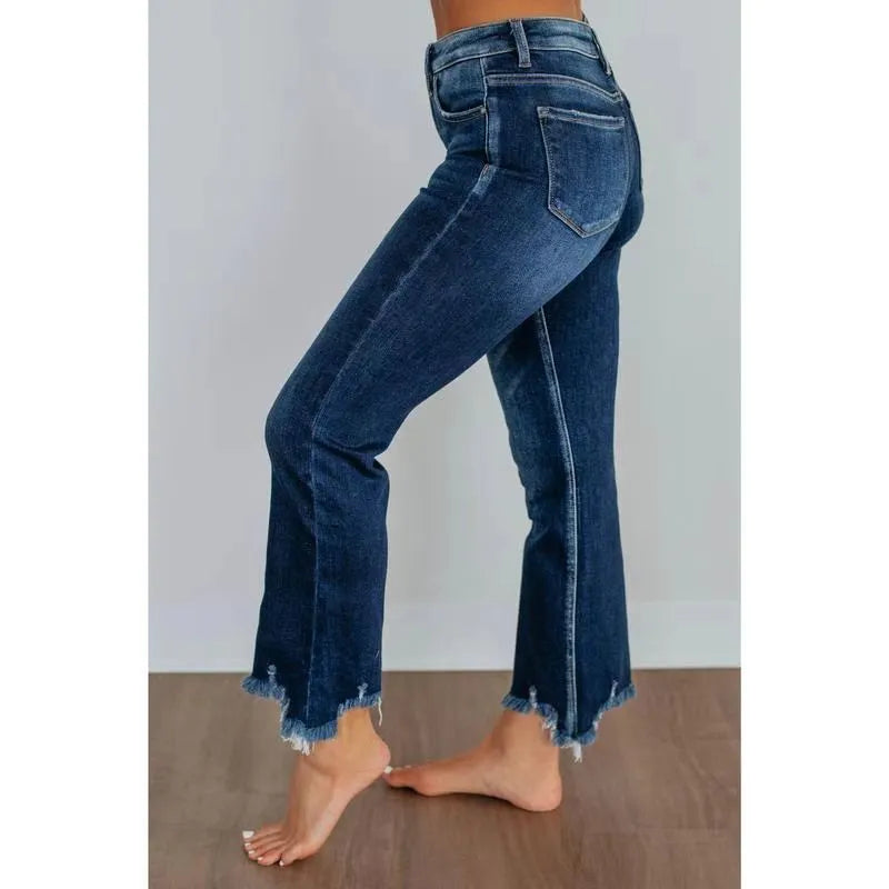 Women's dark blue cotton denim trousers with a hand-distressed casual finish.