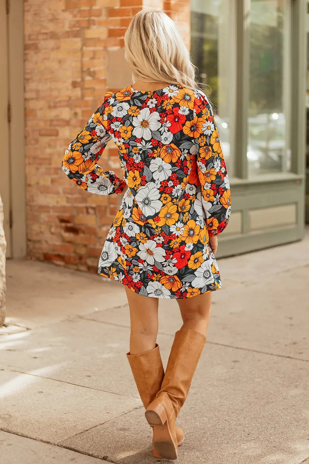 Orange floral striped lace V-neck long sleeve mini dress on hanger