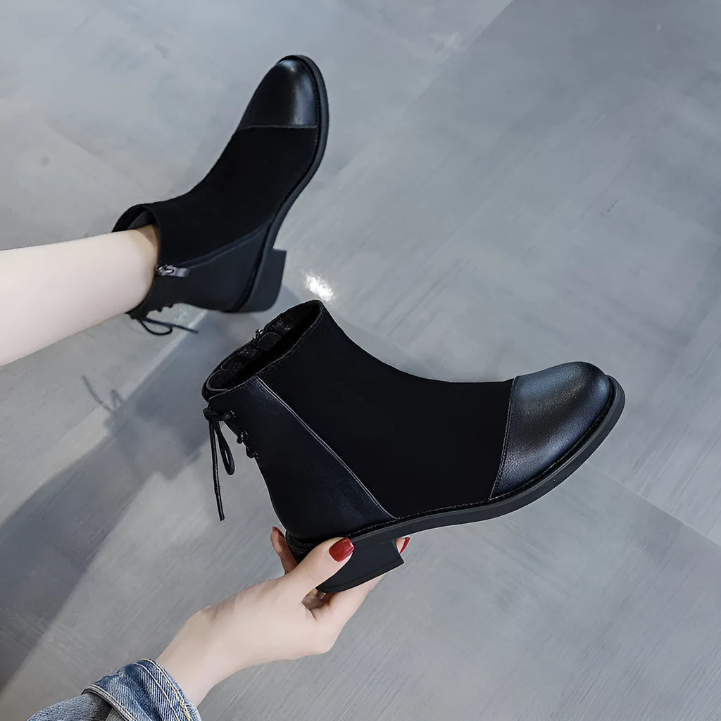 Women's black knee-high Martin boots with side zipper and round toe