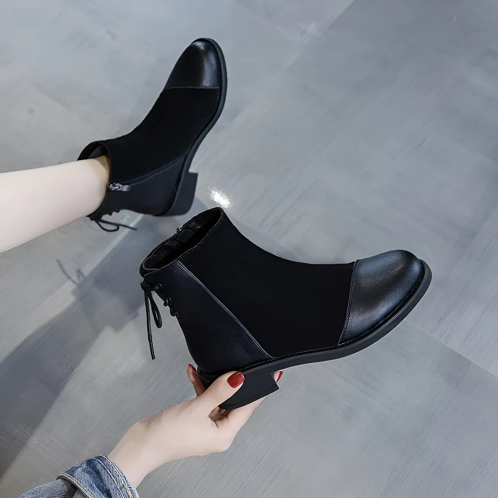 Women's black knee-high Martin boots with side zipper and round toe