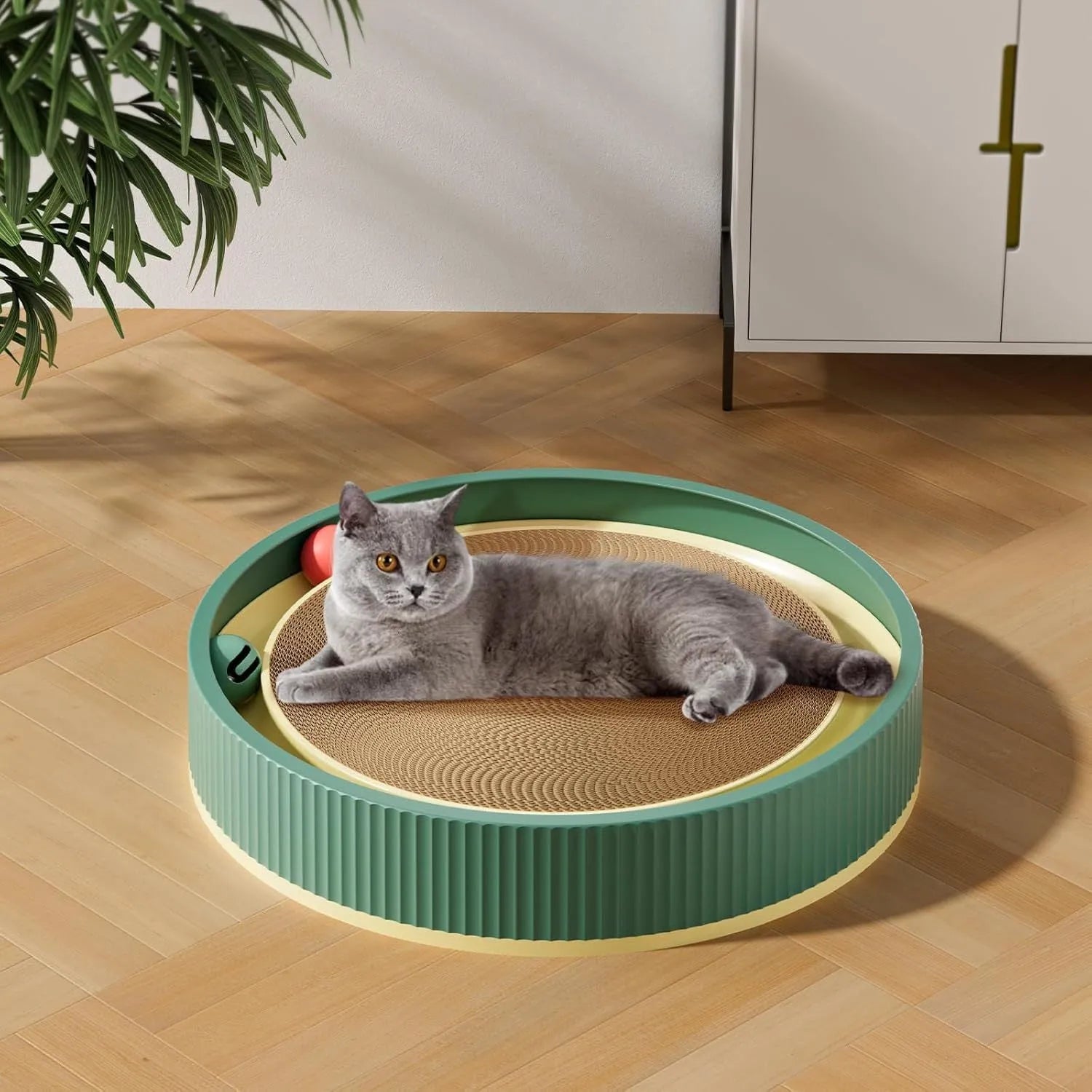 Large green cat scratching board with moving bell balls and replaceable cardboard core