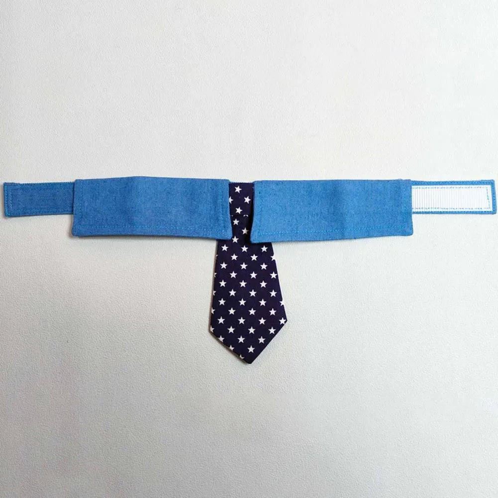 Denim dog collar with blue star pattern and red necktie on adjustable fastener tape.