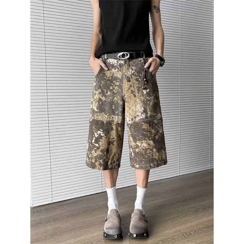Yellow jeans with snake pattern camouflage design and cropped length
