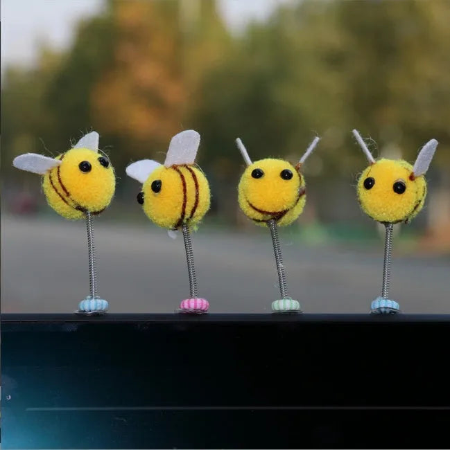 Yellow and black fur ball bee car decoration measuring 3x3 cm