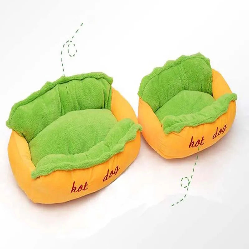 A soft flannelette hot dog bed for pets with a removable mat and anti-slip base, shown in a home setting.