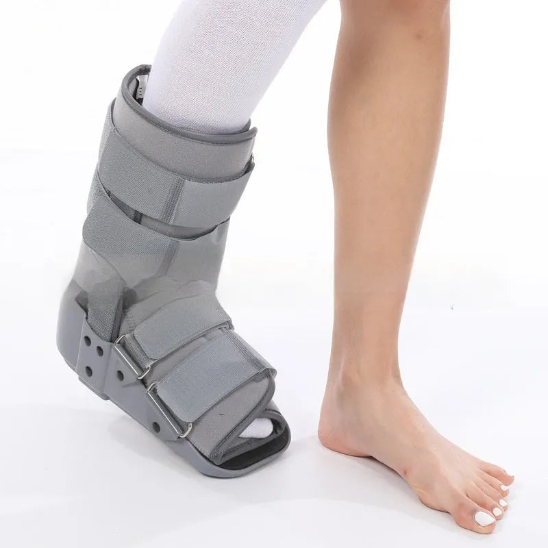 Black Achilles tendon rehabilitation walking boot with adjustable nylon straps and aluminium side supports