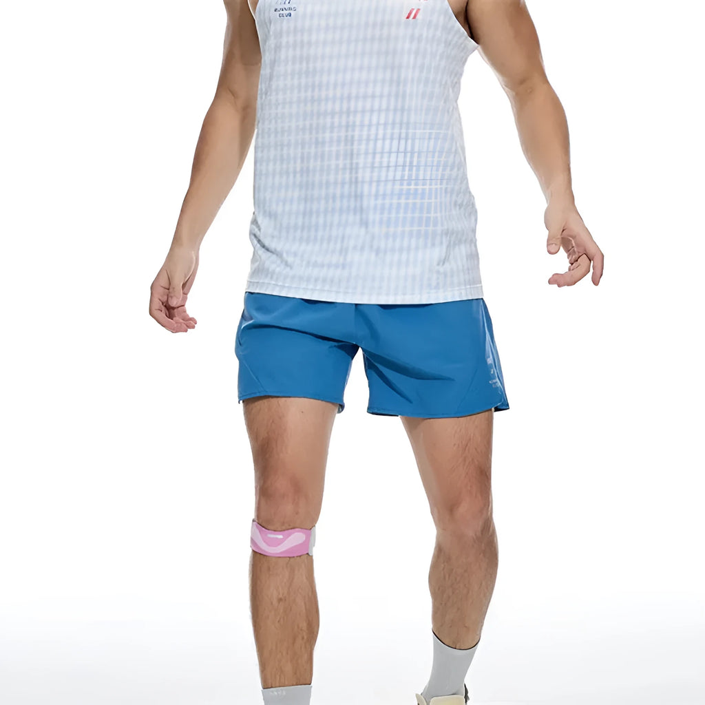 Black and blue four-point running shorts with laser stitching on stretch fabric.