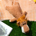 Plush dog grinding teeth toy with corn kernel texture in green, grey or yellow with squeaker