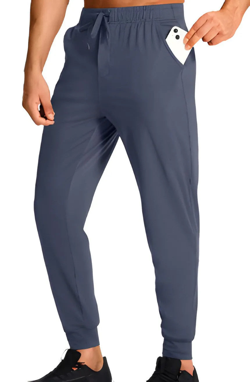 Men's loose casual trousers in solid colour polyester fabric available in multiple sizes
