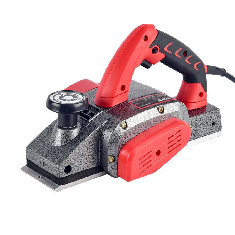 Red desktop electric wood planer with aluminium housing and 82mm planing width